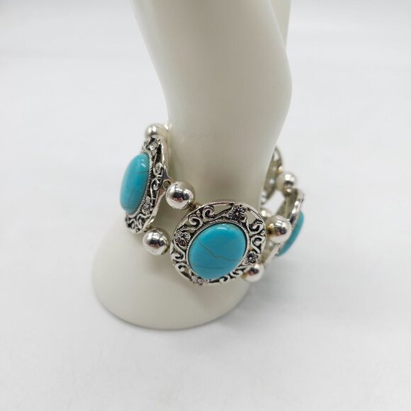 Faux Turquoise Silver Toned Stretch Bracelet With Floral Accents By Erica Lyons - Picture 2 of 5